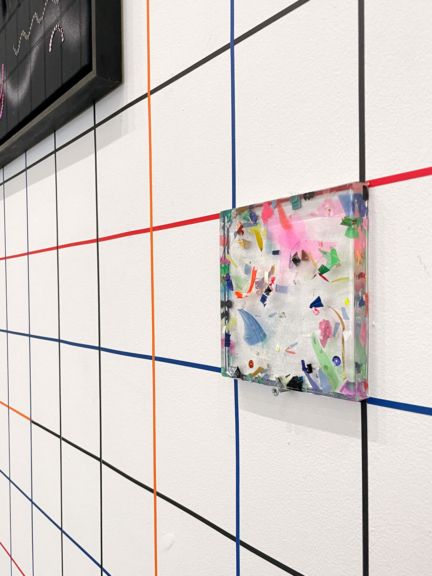 Patricia Sandonis art installation view from a small square sculpture made of plastic and crystal clear and shown at Galería Javier Silva