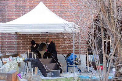 Artists Patricia Sandonis and Jelena Fuzinato working on the sculpture with concrete at Bärenzwinger art gallery in Berlin