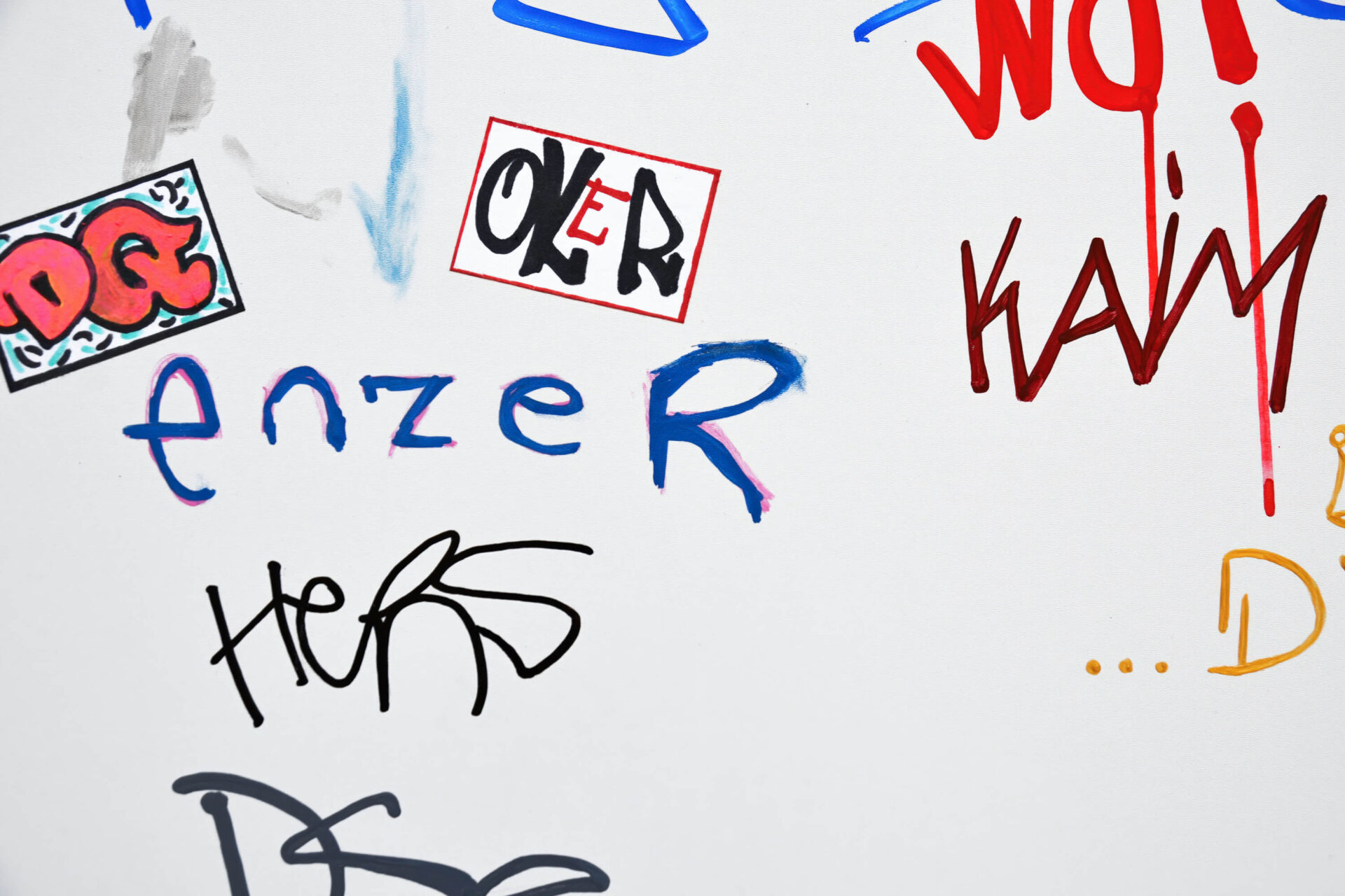 Detail from the artwork Intentional Disobedience, a graffiti painting on a white surface by artist Patricia Sandonis