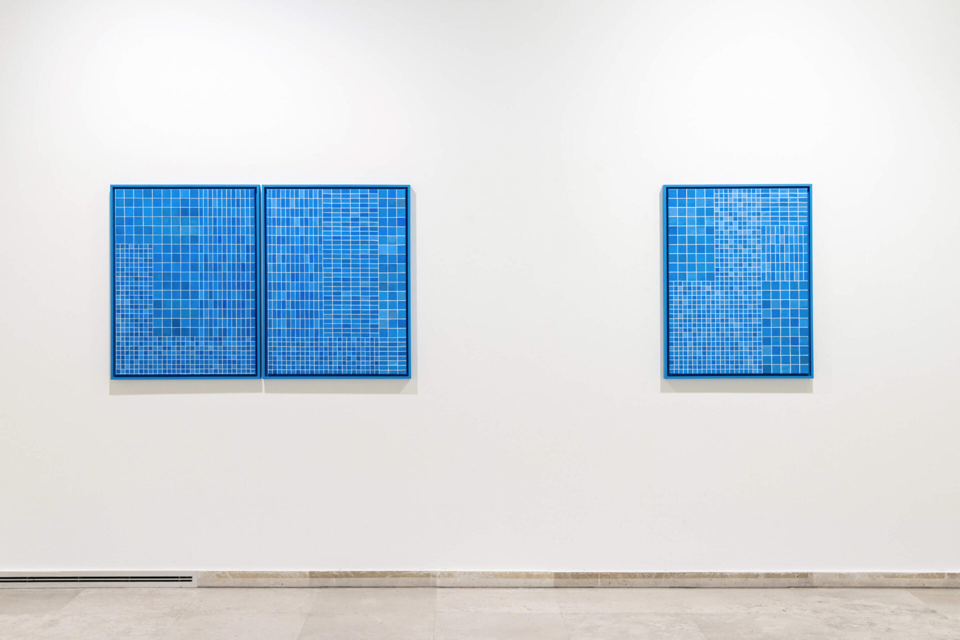 Three oil blue paintings by contemporary artist Patricia Sandonis shown at Museo Patio Herreriano in Valladolid, Spain