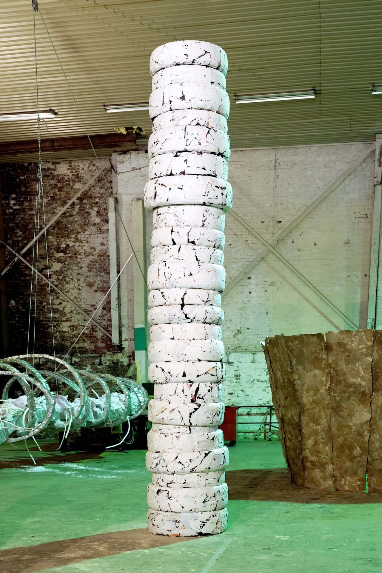 Patricia Sandonis art installation a monumental white column of car tires