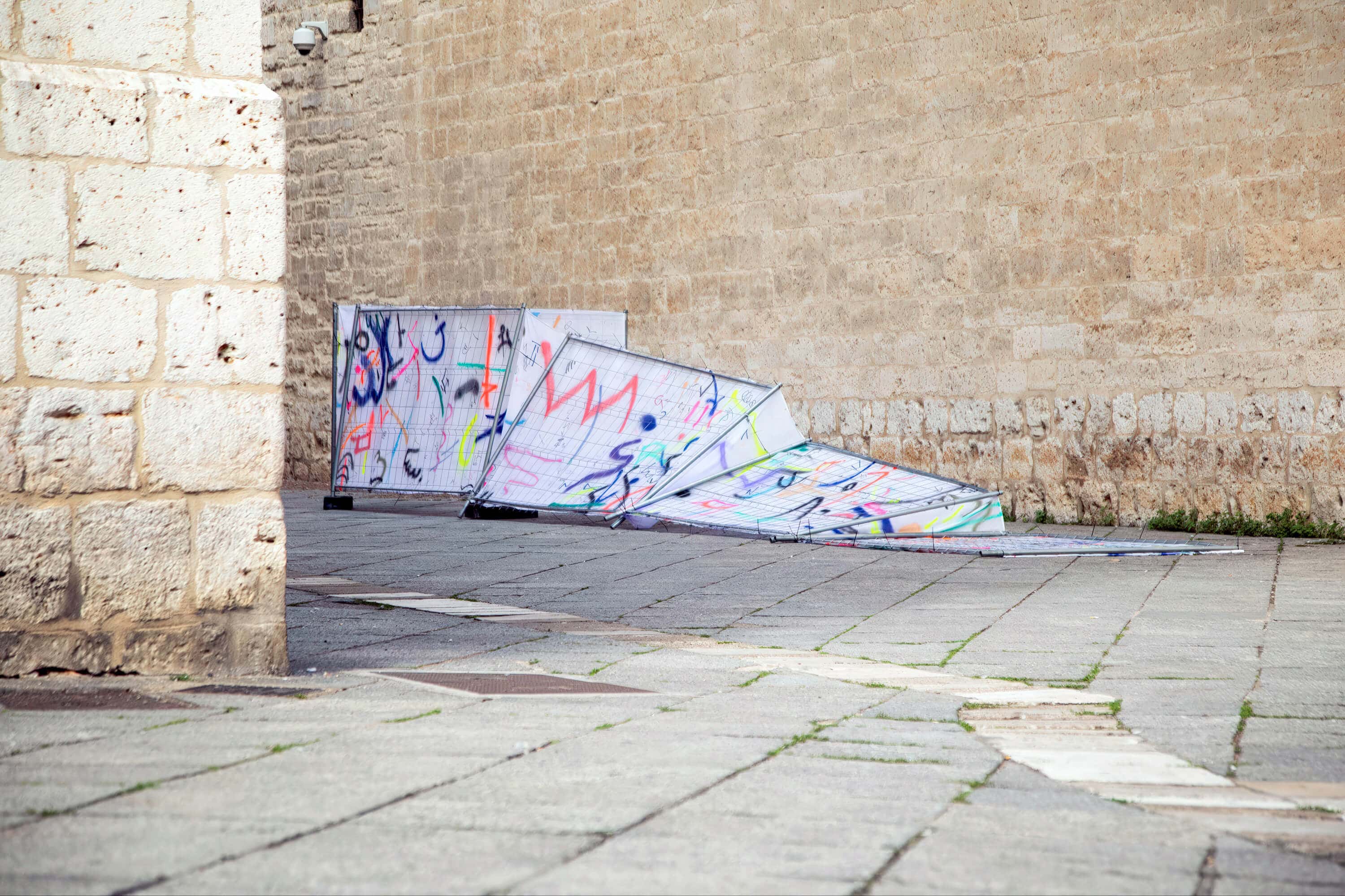 Big-scale painting art installation in the public realm called The Space that Separates Us by artist Patricia Sandonis