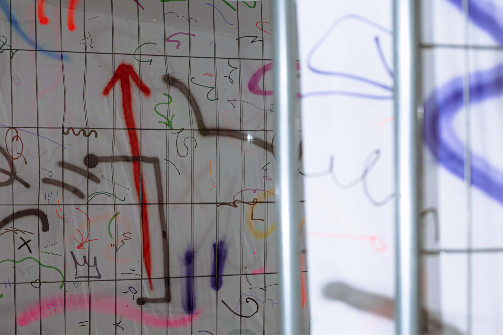 Detail from the big-scale painting by artist Patricia Sandonis, using chiffon fabric on fences