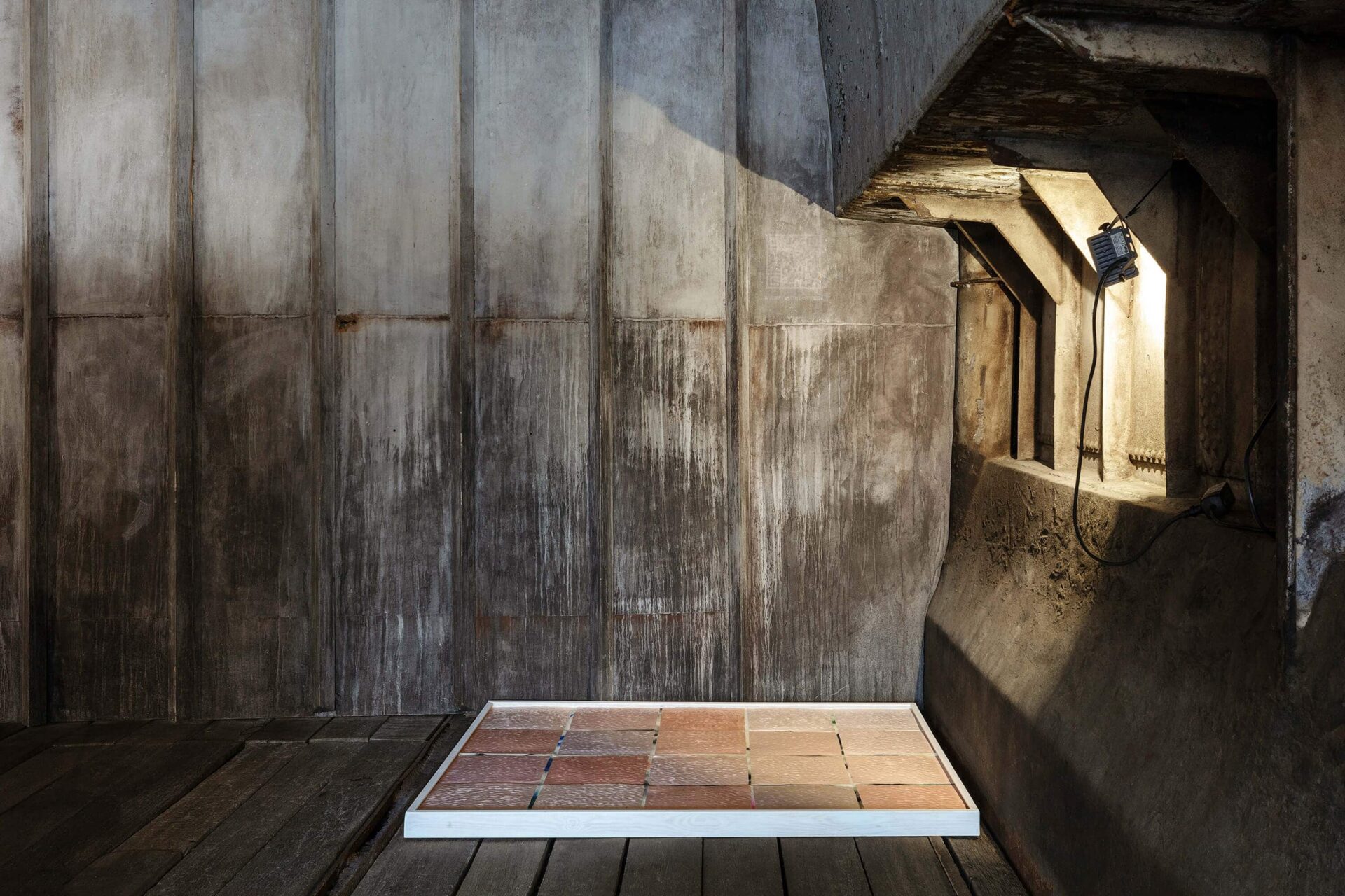 The In Between sculpture glazed ceramic tiles art installation on the floor, by artist Patricia Sandonis at Hošek Contemporary art gallery in Berlin