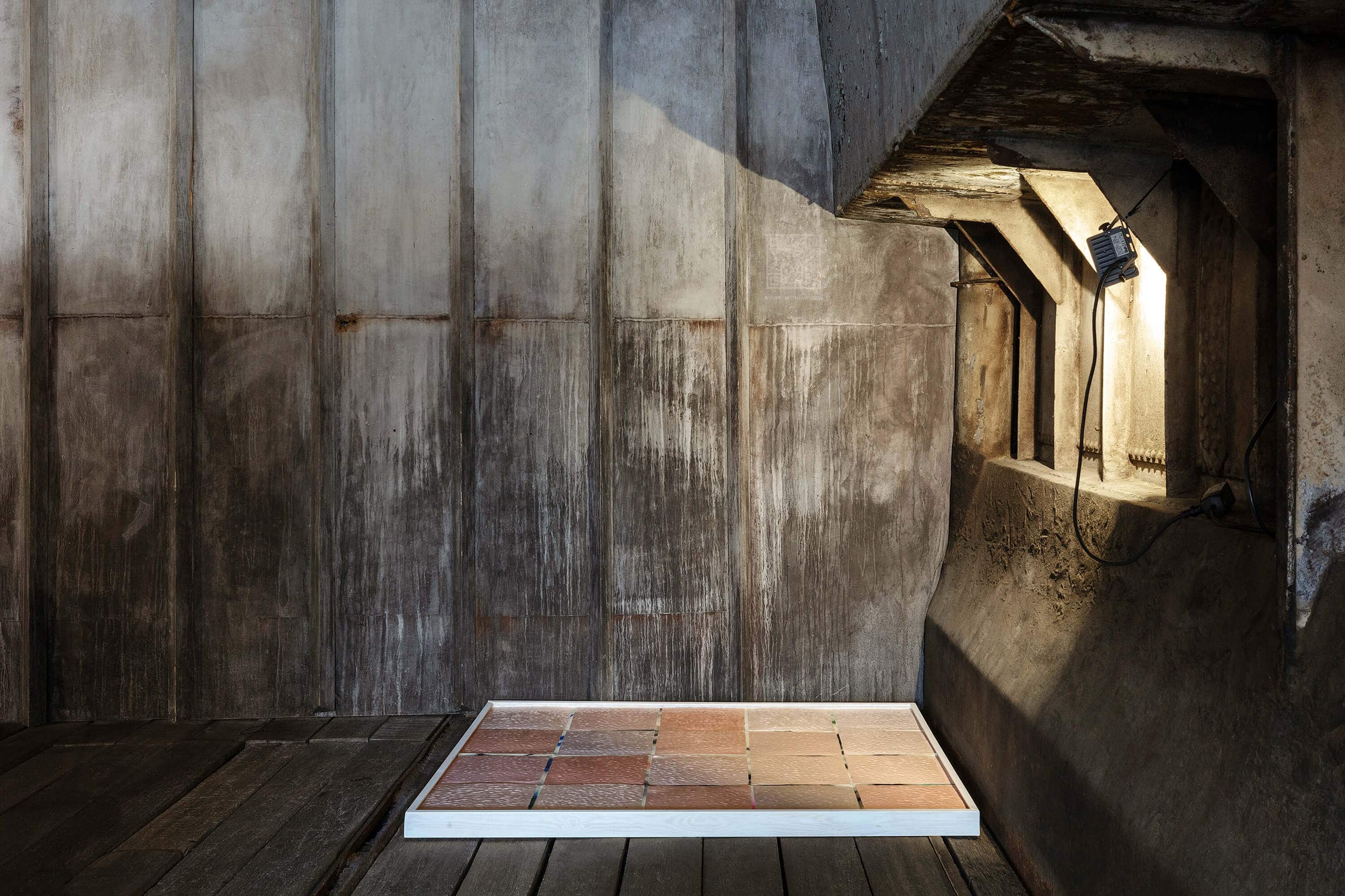 The In Between sculpture glazed ceramic tiles art installation on the floor, by artist Patricia Sandonis at Hošek Contemporary art gallery in Berlin